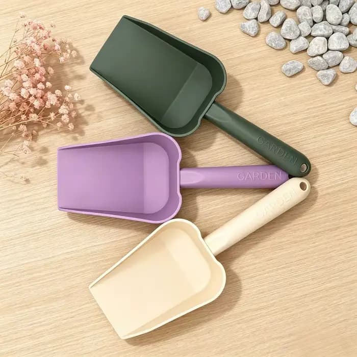 Truelle de jardin violette en résine