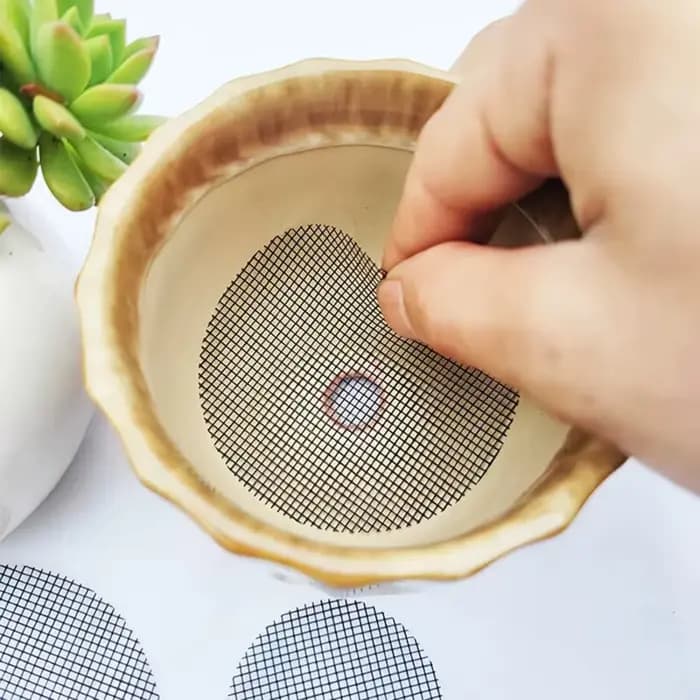Tapis en maille pour trous de Pot