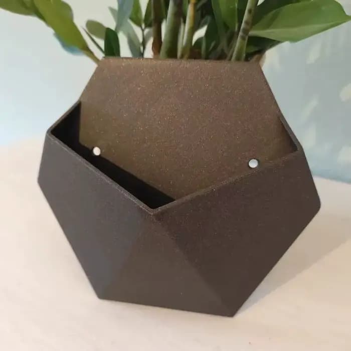 Pot de fleurs mural hexagonal noir avec trous de fixation