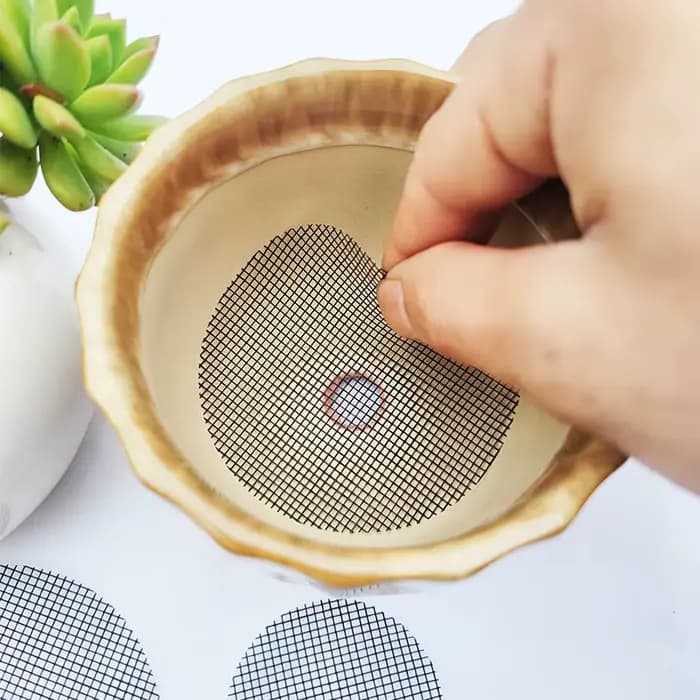 Tapis d'écran pour trous de Pot