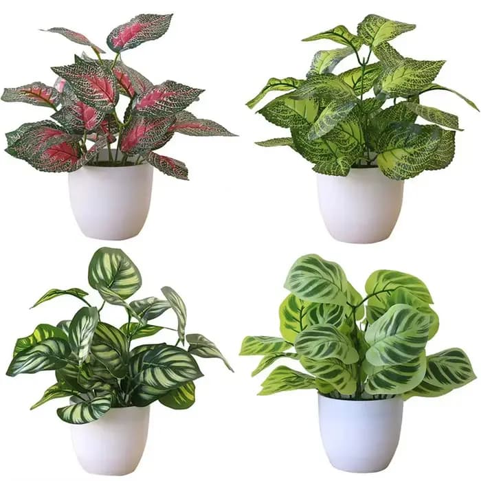 Pot de plantes à feuillage artificiel