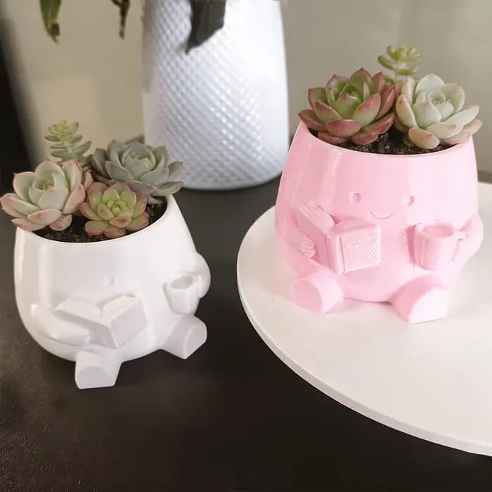 Pot de fleurs en plastique léger avec personnage lisant un livre - Décoration d'intérieur