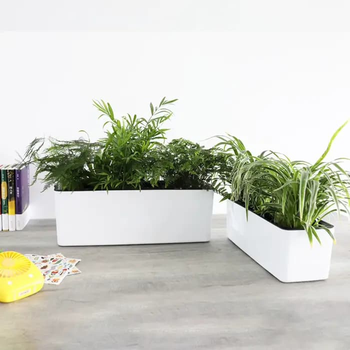 Pot de fleur à arrosage automatique avec indicateur de niveau d'eau