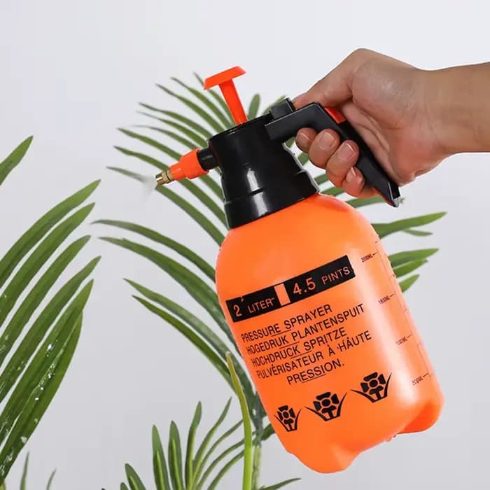 Arrosoir épais domestique pour l'arrosage des fleurs