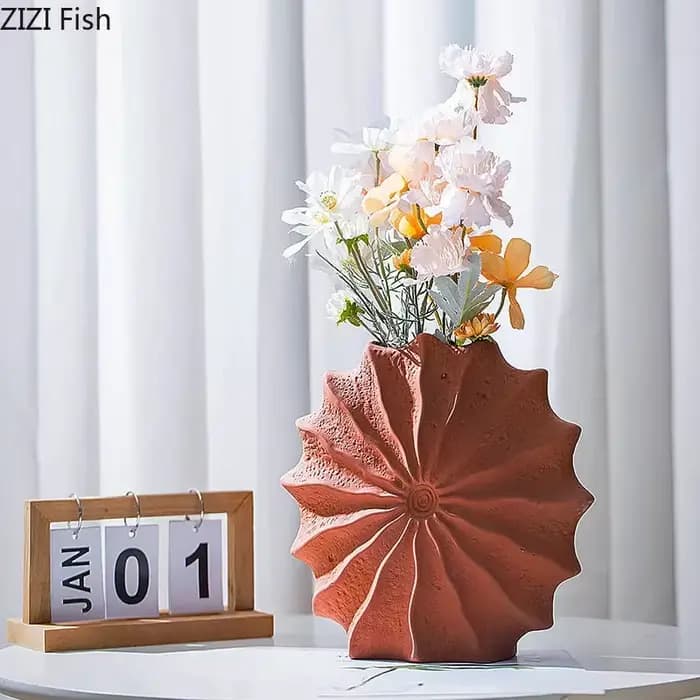 Vase en céramique minimaliste en forme de coquillage