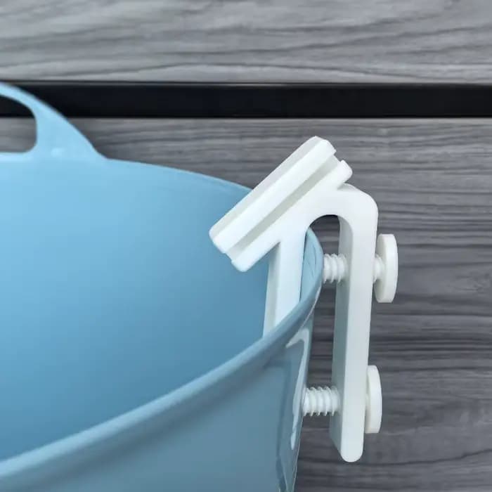 Support de tuyau d'arrosage avec clip de fixation efficace pour un rangement sécurisé du tuyau sur le rebord du seau en jardinage domestique