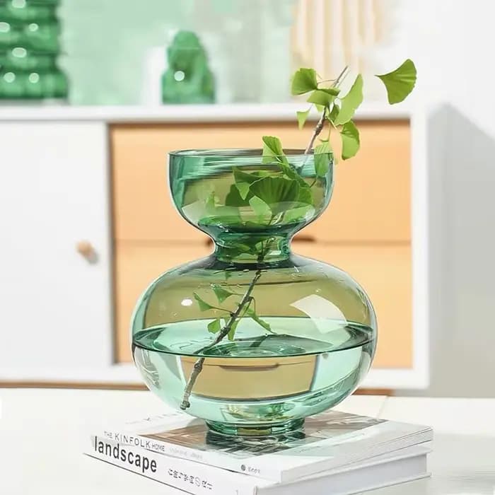 Vase en verre rond vert pour fleurs