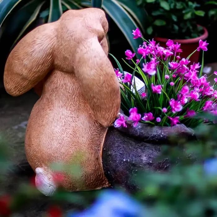 Pot de fleur lapin de lecture