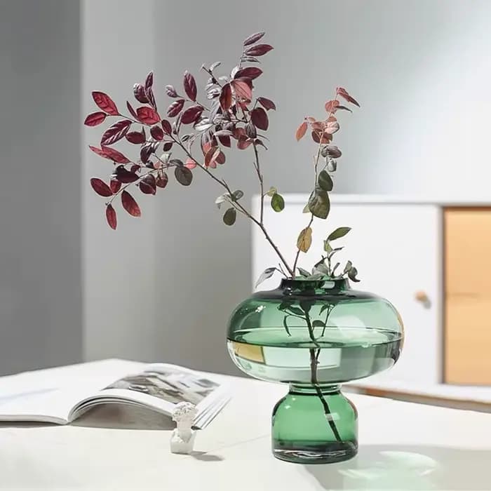 Vase en verre rond vert pour fleurs