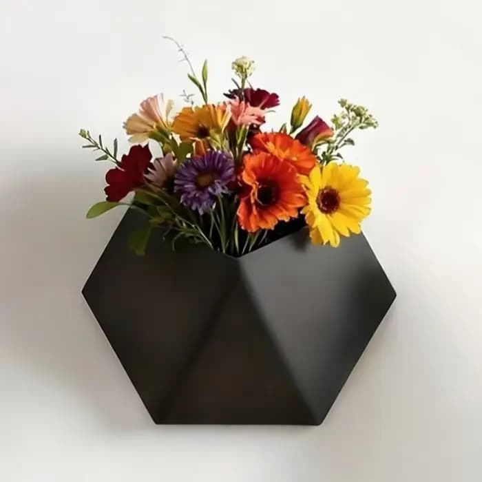 Pot de fleurs mural hexagonal noir avec trous de fixation