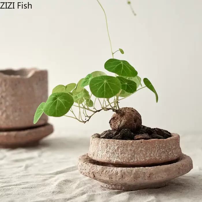 Pot de fleur en céramique fait à la main avec base